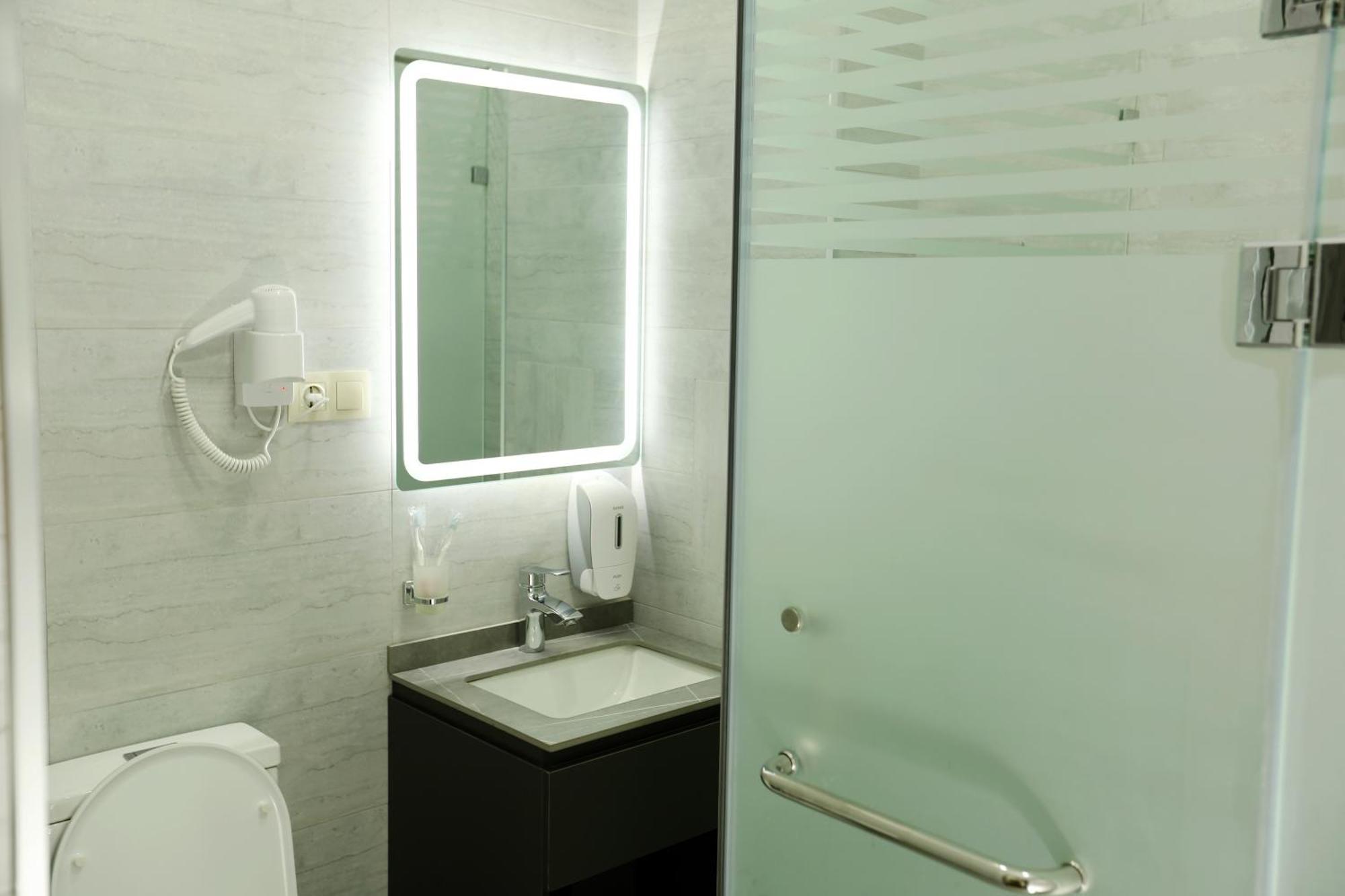 Parklane Hotel Tasjkent Rom bilde